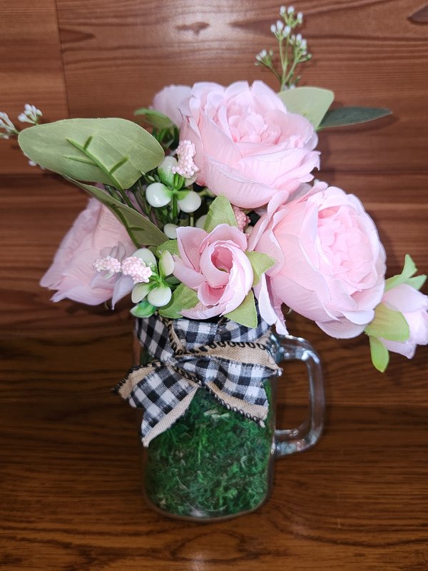 Pink floral decor with gingham bow