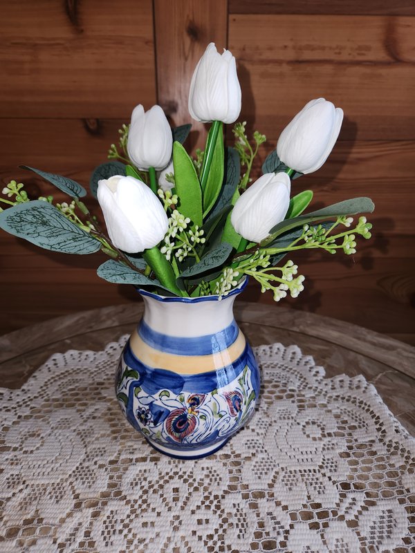 Tulips in blue and white vase