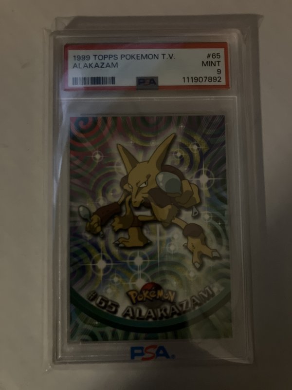 Alakazam 1999 Pokemon Topps Card PSA 9