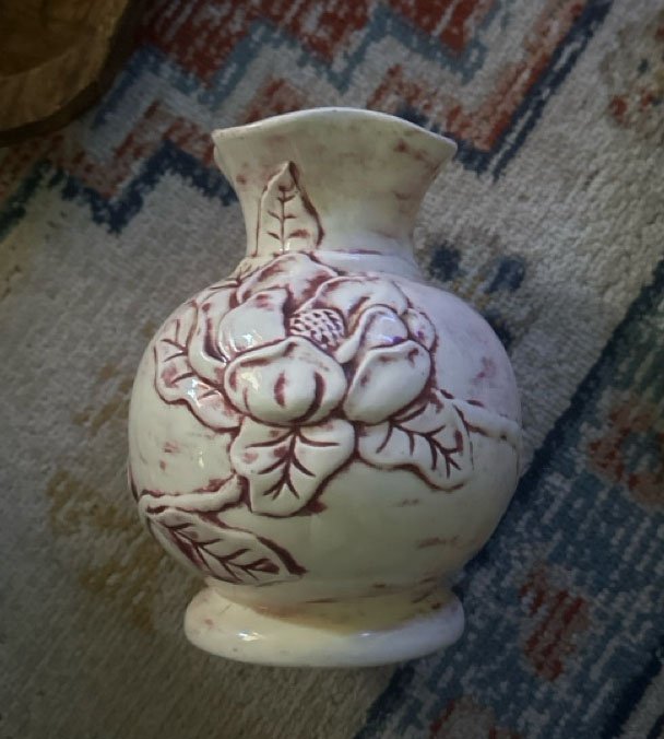 Vase with embossed flowers