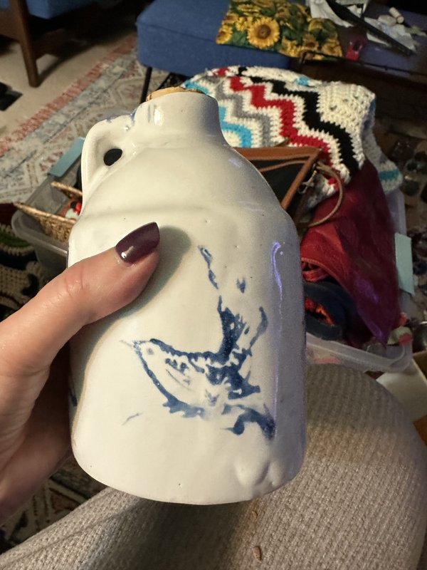 pottery jug with painted birds