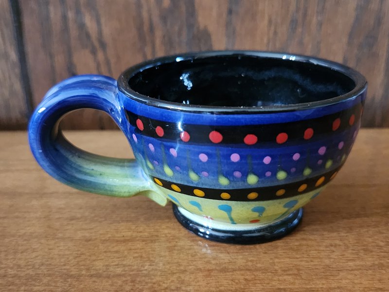 Blue handle tea cup
