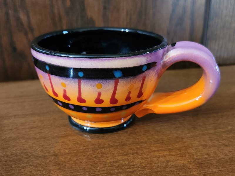Purple handle tea cup