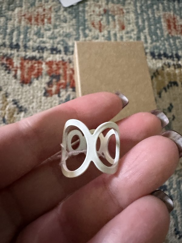 white metal ring