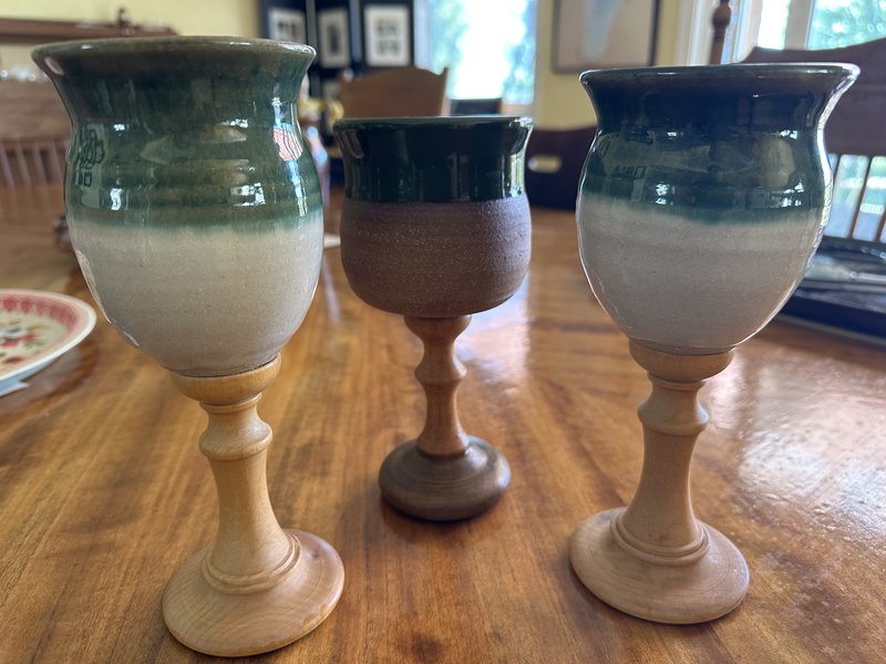 Handmade Ceramic wine goblets with wood base.