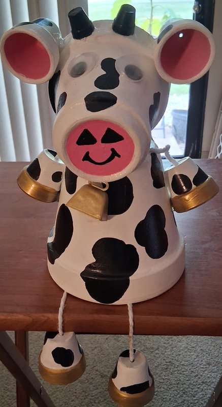 Hand-painted terracotta pot cow figurine