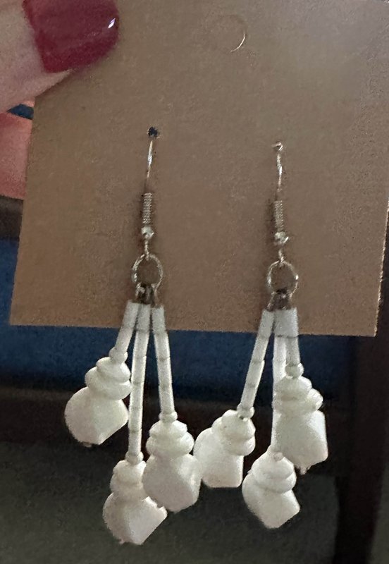white dangle earrings