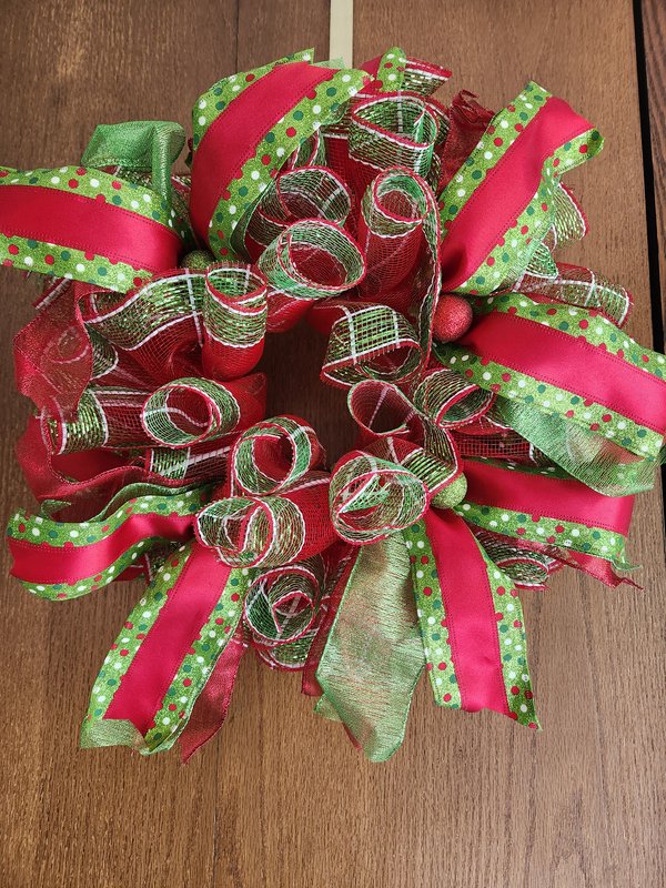 Green and red deco mesh wreath