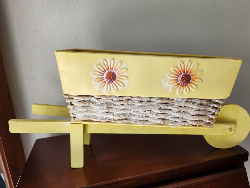 Yellow wheelbarrow decor