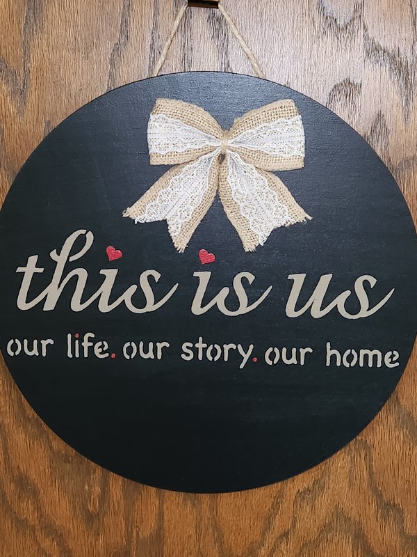 "This Is Us" round sign
