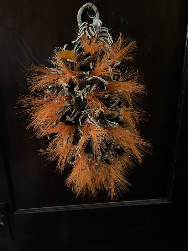 Orange and black Feather while hanging or table decoration